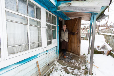 VINNITSY, RUSSIA - NOV 30, 2015: Elderly woman Veps - small Finno-Ugric peoples living on the territory of Leningrad region in Russia. According to the 2002 census, there were 8,240 Veps in Russia.のeditorial素材