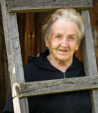 Portrait of an elderly woman in the village.の写真素材