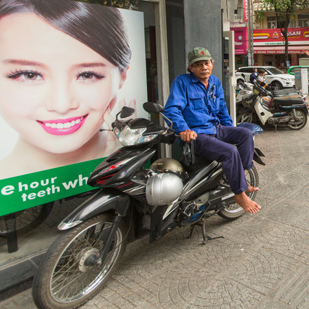 HO CHI MINH CITY, VIETNAM - JAN 13, 2016: Lokal moto rickshaw waiting of cliens. Ho Chi Minh is located in the South of Vietnam, is the country's largest city, population 8 million.のeditorial素材