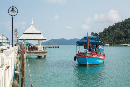 KOH CHANG, THAILAND - JAN 30, 2016: Tourist boat at the pier in Bang Bao fishing village (most touristic on the Island) From the pier of Bang Bao daily boats for excursions (500-1000 baht per person).のeditorial素材