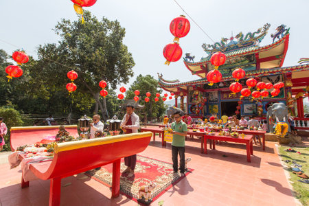 KOH CHANG, THAILAND - JAN 7, 2016: During the celebration Chinese New Year in the Chinese temple. 4714 year (traditional lunisolar Chinese calendar) begins February 8, characters: Monkey, fire, red.のeditorial素材