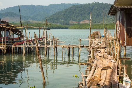 KOH CHANG, THAILAND - FEB 4, 2016: Huts at the pier in at fisherman village. In Thailand second most...