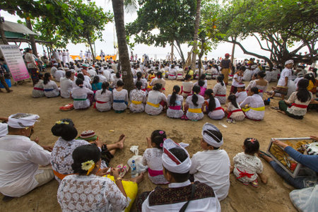 SANUR, BALI - MAR 18, 2016: Unidentified local people during ceremony Melasti Ritual. Melasti is a Hindu Balinese purification ceremony and one of the most important rituals of Bali island.のeditorial素材