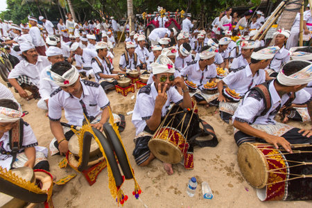 SANUR, BALI - MAR 18, 2016: Unidentified local people during ceremony Melasti Ritual. Melasti is a Hindu Balinese purification ceremony and one of the most important rituals of Bali island.のeditorial素材