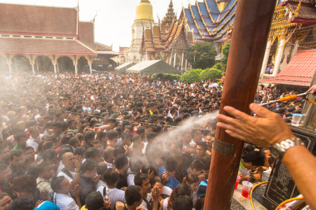 WAT BANG PHRA, THAILAND - MART 19, 2016: Blessing with Holy water of participants Wai Kroo (Luang Por Phern) Master Day Ceremony at Wat Bang Phra monastery, about 50 km of Bangkok.のeditorial素材