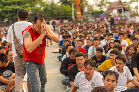 WAT BANG PHRA, THAILAND - MAR 19, 2016: Unknown participants of Master Day Ceremony at able Khong Khuen (spirit possession) during the Wai Kroo ritual at Bang Pra monastery, about 50 km of Bangkok.のeditorial素材