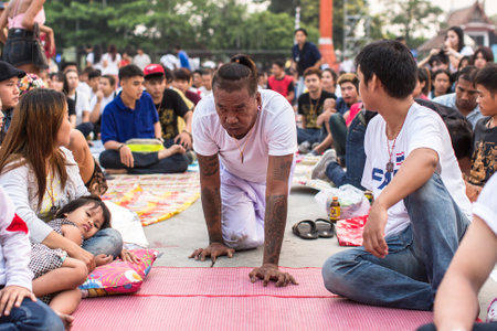 WAT BANG PHRA, THAILAND - MAR 19, 2016: Unknown participants of Master Day Ceremony at able Khong Khuen - spirit possession during the Wai Kroo ritual at Bang Pra monastery, about 50 km west of Bangkok.のeditorial素材