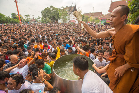 WAT BANG PHRA, THAILAND - MART 19, 2016: Blessing with Holy water of participants Wai Kroo (Luang...