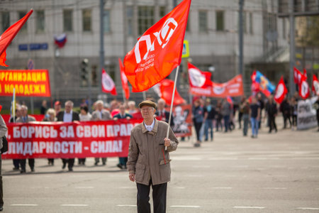 MOSCOW, RUSSIA - MAY 1, 2016: Unidentified Communist party supporters together with National Bolsheviks take part in a rally marking the May Day in the  center of Moscow.のeditorial素材
