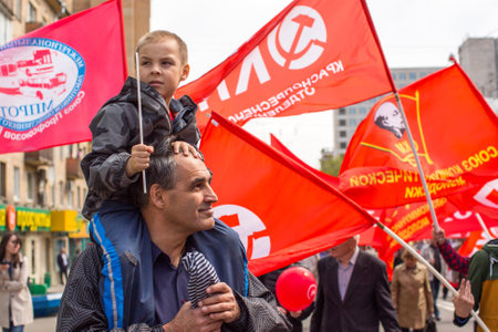 MOSCOW, RUSSIA - MAY 1, 2016: Unidentified Communist party supporters together with National Bolsheviks take part in a rally marking the May Day in the  center of Moscow.のeditorial素材
