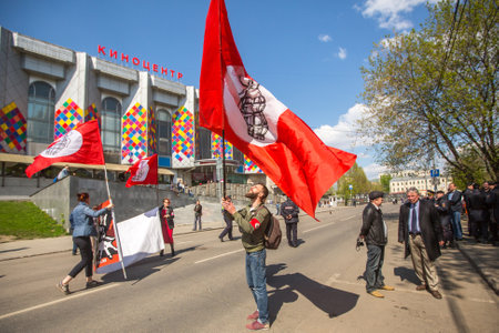 MOSCOW, RUSSIA - MAY 1, 2016: Unidentified National Bolsheviks, together with Communist party supporters take part in a rally marking the May Day in the  center of Moscow.のeditorial素材