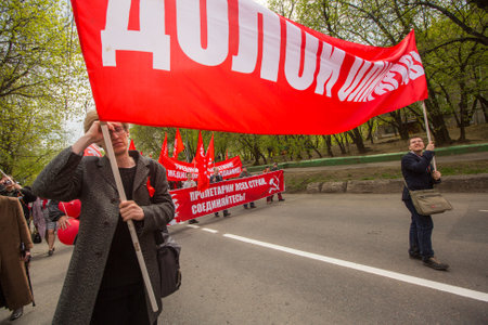 MOSCOW, RUSSIA - MAY 1, 2016: Communist party supporters together with National Bolsheviks take part in a rally marking the May Day in the  center of Moscow.のeditorial素材