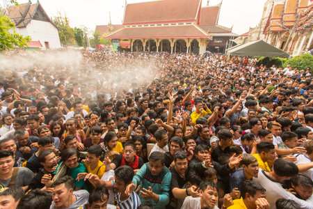WAT BANG PHRA, THAILAND - MART 19, 2016: Blessing with Holy water of participants Wai Kroo (Luang Por Phern) Master Day Ceremony at Wat Bang Phra monastery, about 50 km of Bangkok.のeditorial素材