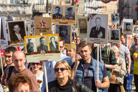 St.PETERSBURG, RUSSIA - MAY 9, 2016: March of Immortal Regiment, timed to 71st anniversary of the Victory in the great Patriotic war. Action in its present form was initiated  in Tyumen in May 2007.のeditorial素材