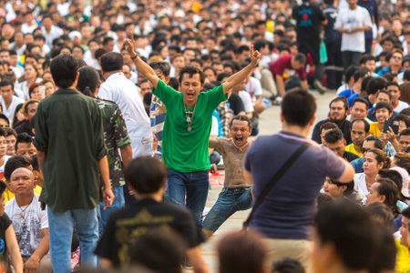 WAT BANG PHRA, THAILAND - MAR 19, 2016: Unknown participants of Master Day Ceremony at able Khong Khuen (spirit possession) during the Wai Kroo ritual at Bang Pra monastery, about 50 km of Bangkok.のeditorial素材