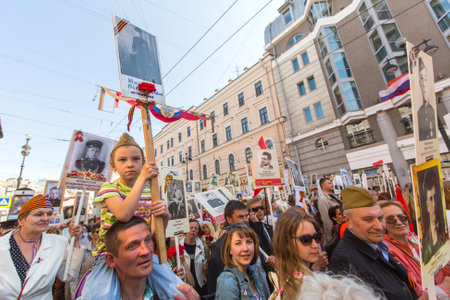 St.PETERSBURG, RUSSIA - MAY 9, 2016: March of Immortal Regiment, timed to 71st anniversary of the Victory in the great Patriotic war. Action in its present form was initiated  in Tyumen in May 2007.のeditorial素材
