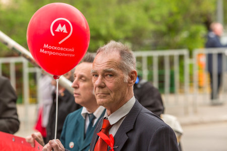 MOSCOW - MAY 1, 2016: Communist party supporters together with National Bolsheviks take part in a rally marking the May Day in the center of Moscow.のeditorial素材