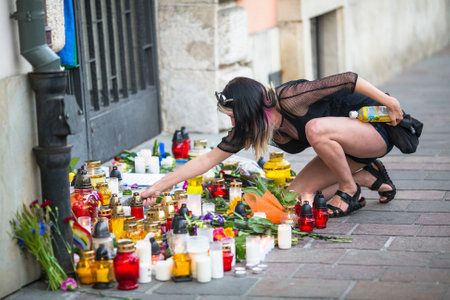 KRAKOW, POLAND - JUNE 13, 2016: Action near American Consulate in memory of victims of the massacre in popular gay club Pulse in Orlando, Florida. 50 people were killed, 53 wounded.のeditorial素材