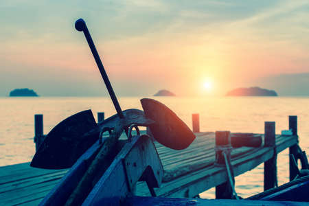 Thai fishing boats anchor at the stunning sunset.の写真素材