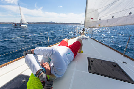 MILOS, GREECE - SEP 26, 2016: Sailors participate in sailing regatta 16th Ellada Autumn 2016 among Greek island group in the Aegean Sea, in Cyclades and Saronic Gulf.のeditorial素材