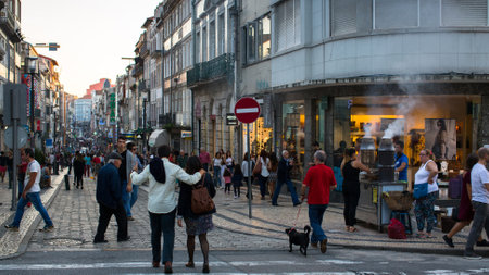 PORTO, PORTUGAL - OCT 30, 2016: Rua de Santa Catarina - it is the artery of best shopping of Downtown Porto. Length of the street 1.482 m, forbidden to car traffic and reserved only for pedestrians.のeditorial素材
