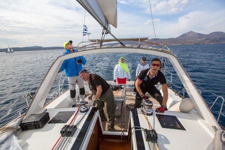 MILOS, GREECE - SEP 26, 2016: Sailors participate in sailing regatta 16th Ellada Autumn 2016 among...