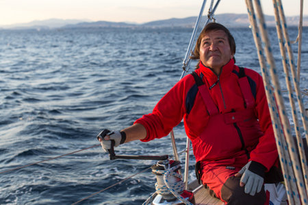 ATHENS, GREECE - SEP 24, 2016: Sailors participate in sailing regatta 16th Ellada Autumn 2016 among Greek island group in the Aegean Sea, in Cyclades and Saronic Gulf.のeditorial素材