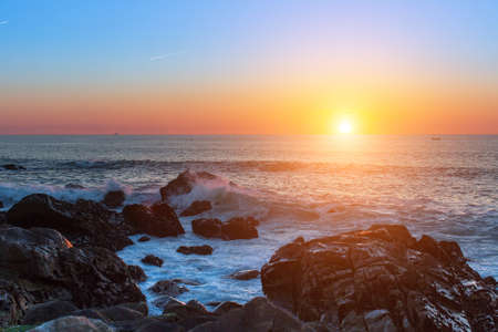 Sunset on the rocky Atlantic coast.の写真素材