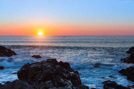 Beautiful sunset on the ocean coast.の写真素材