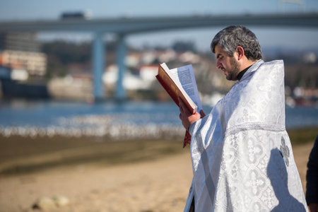 PORTO, PORTUGAL - JAN 19, 2017: Celebrating Baptism of Jesus in the Parish of Russian Orthodox Church near Douro river. This is one of the holiest holidays for all Christians.のeditorial素材