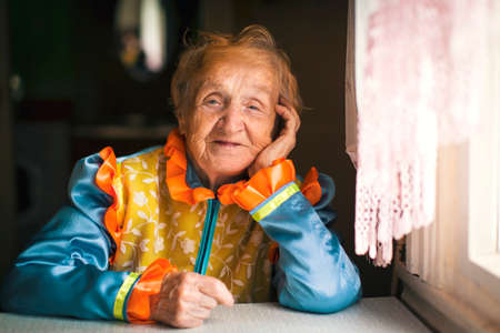 An elderly woman in Slavic ethnic clothing.の写真素材
