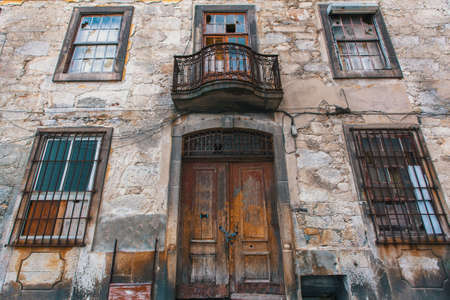 Facade of abandoned house building. の写真素材