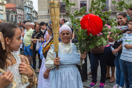 PORTO, PORTUGAL - JUN 25, 2017: Participants Festival of St John. Happens every year during Midsummer, thousands of people come to the city centre in a party that mixes sacred and profane traditions.のeditorial素材