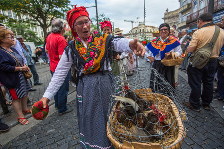 PORTO, PORTUGAL - JUN 25, 2017: Participants Festival of St John. Happens every year during Midsummer, thousands of people come to the city centre in a party that mixes sacred and profane traditions.のeditorial素材
