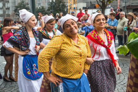 PORTO, PORTUGAL - JUN 25, 2017: Participants Festival of St John. Happens every year during Midsummer, thousands of people come to the city centre in a party that mixes sacred and profane traditions.のeditorial素材
