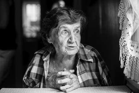 Black-and-white portrait of an elderly woman.の写真素材