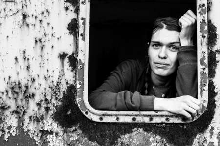 Black and white contrast portrait of a young attractive woman.の写真素材