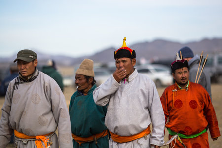 OLGIY, MONGOLIA - SEP 30, 2017: Participants at traditional clothing, during annual national competition with birds of prey "Berkutchi" of West Mongolia.のeditorial素材