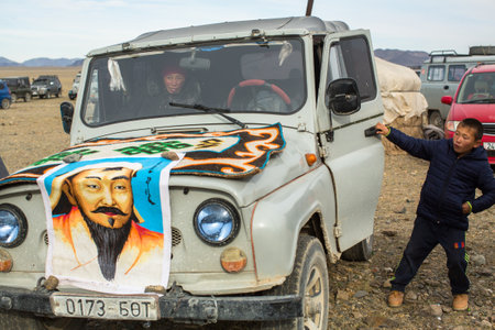 OLGIY, MONGOLIA - SEP 30, 2017: Street sellers Souvenirs at car during annual national competition with birds of prey "Berkutchi" of West Mongolia.のeditorial素材
