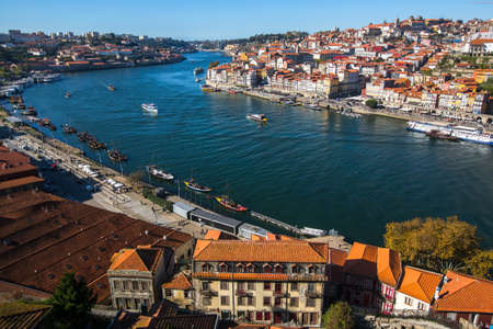 View of the old downtown of Porto and Douro river from Vila Nova de Gaia, Portugal.の写真素材