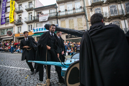 PORTO, PORTUGAL - MAY 9, 2017: Participants of Queima Das Fitas Parade - traditional festivity of students of Portuguese universities. Porto's Queima was the first to reborn after the 1974 revolution.のeditorial素材