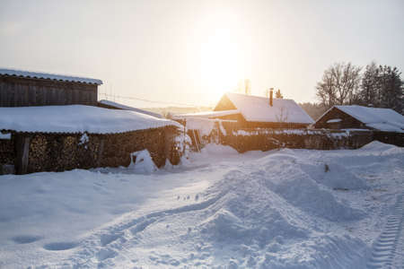 Snowy winter village outdoors in the Karelia Republic, Russia.の写真素材