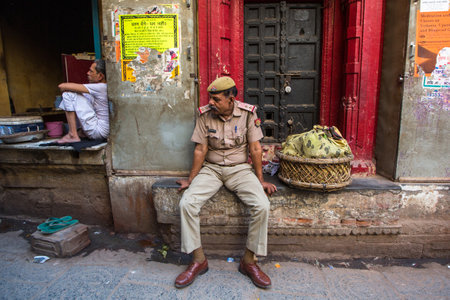 VARANASI, INDIA - MAR 16, 2018: Police patrol the streets of the city. According to legends, the city was founded by God Shiva about 5000 years ago.のeditorial素材