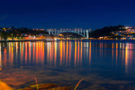 Douro river, at night in the light of lights, Porto, Portugal.の写真素材