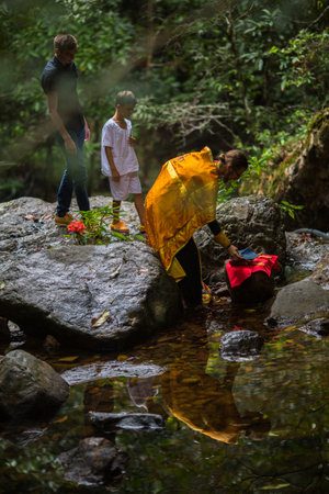 KOH CHANG, THAILAND - MAR 9, 2018: During Christian sacrament of spiritual birth - Baptism. There are currently 10 Orthodox parishes in Thailand, Orthodoxy is practiced by 0.002% of population.のeditorial素材