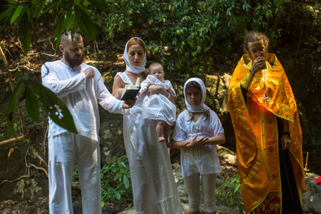 KOH CHANG, THAILAND - MAR 10, 2018: During christian orthodox sacrament Baptism. There are currently 10 Orthodox parishes in Thailand, Orthodoxy is practiced by 0.002% of population.のeditorial素材