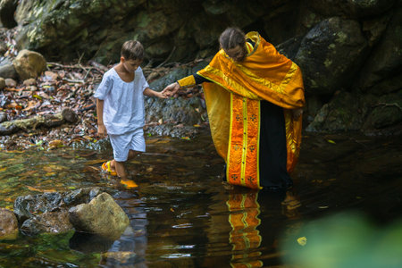 KOH CHANG, THAILAND - MAR 9, 2018: During Christian sacrament of spiritual birth - Baptism. There are currently 10 Orthodox parishes in Thailand, Orthodoxy is practiced by 0.002% of population.のeditorial素材