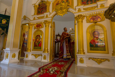 KOH CHANG, THAILAND - FEB 28, 2018: During the Sunday service in Russian Orthodox Church. There are...