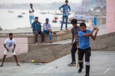 VARANASI, INDIA - MAR 29, 2018: On the banks of the sacred Ganges river at evening. According to legends, Varanasi city was founded by God Shiva about 5000 years ago.のeditorial素材