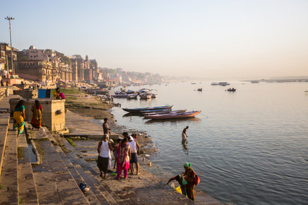 VARANASI, INDIA - MAR 19, 2018: Banks on the holy Ganges river in the early morning. According to legends, the city was founded by God Shiva about 5000 years ago.のeditorial素材